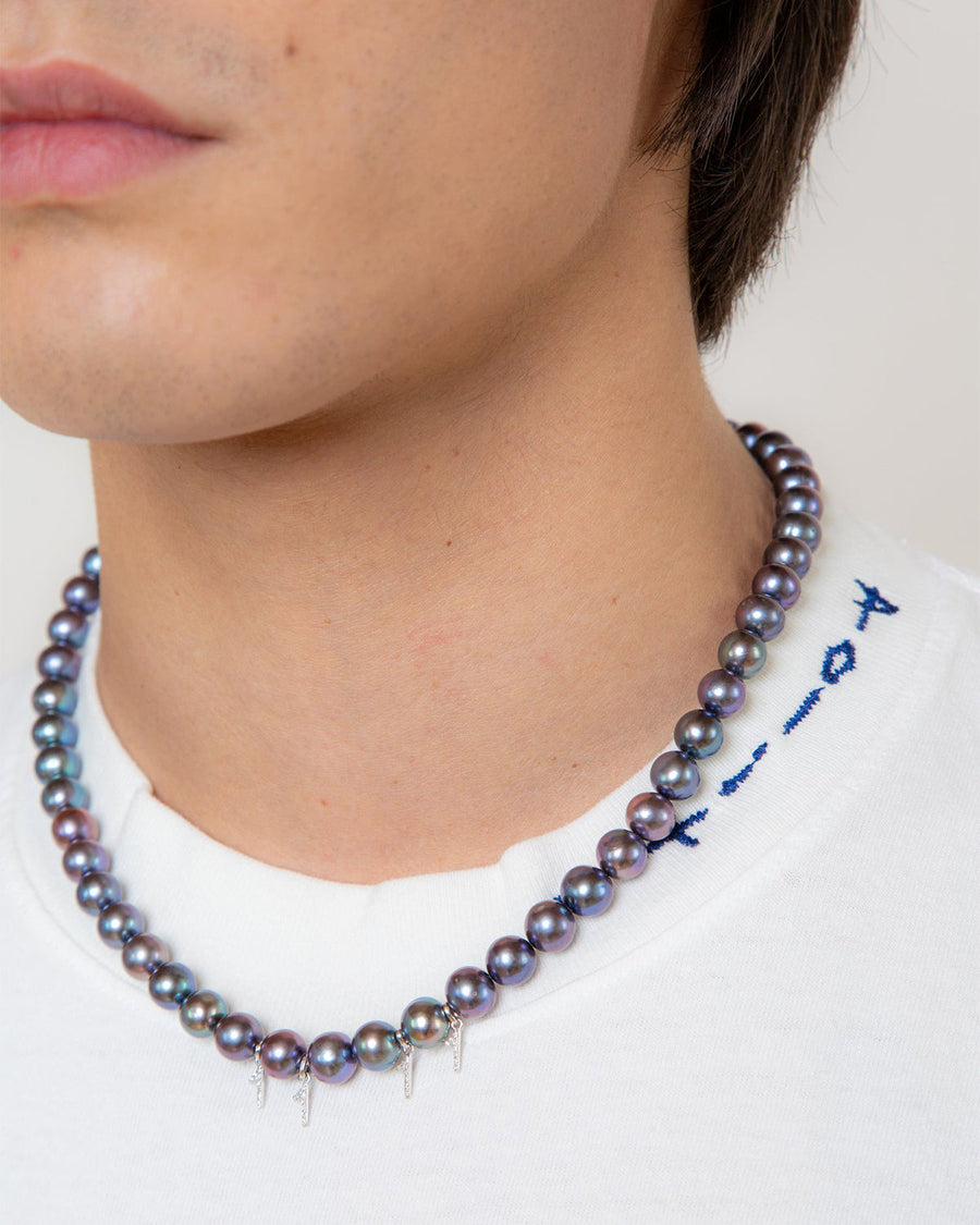 The Night Pearl Necklace worn, the 11:11 in diamond at the front