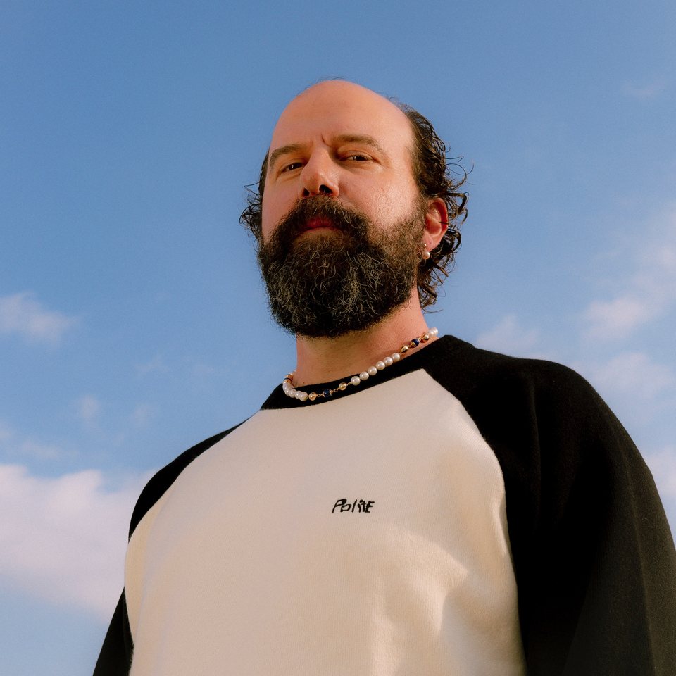 Brett Gelman wearing the Tradition Necklace